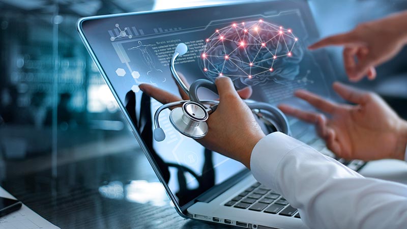Diagnose checking brain testing result with modern virtual screen interface on laptop with stethoscope in hand, Medical technology network connection concept
