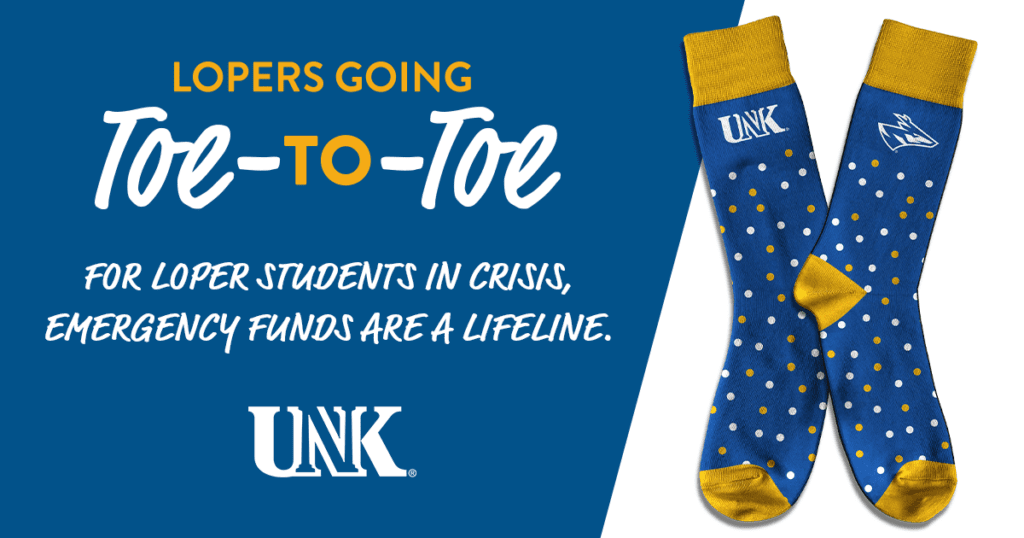 Graphic of UNK sock campaign with pair of blue and yellow polkadot socks with the UNK loper on top.